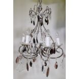 An antiqued copper six branch chandelier, with amethyst lustre drops, 100cm drop with chain, 56cm