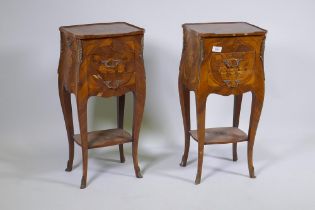 A pair of Louis XV style bombe shaped marquetry inlaid tulipwood bedside cabinets with two drawers