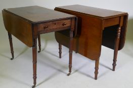 A Georgian mahogany pembroke table with single end drawer, raised on tapering supports with ring and