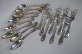 A matched set of eight C18th French silver thread and shell pattern spoons and forks, 1483g