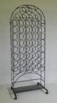 A wrought metal wine rack, 59 x 22 x 152cm