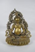 A Tibetan bronze figure of Jambhala, 31cm high