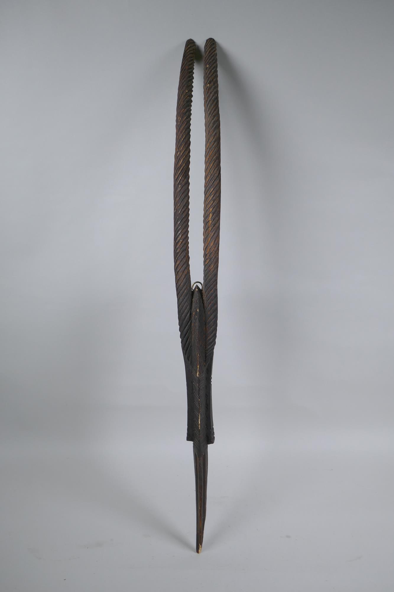 An African carved Chiwara (antelope) mask, probably from Mali, 77cm high - Image 2 of 3