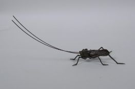 A Japanese Jizai style okimono beetle with articulated limbs and antennae, 15cm long