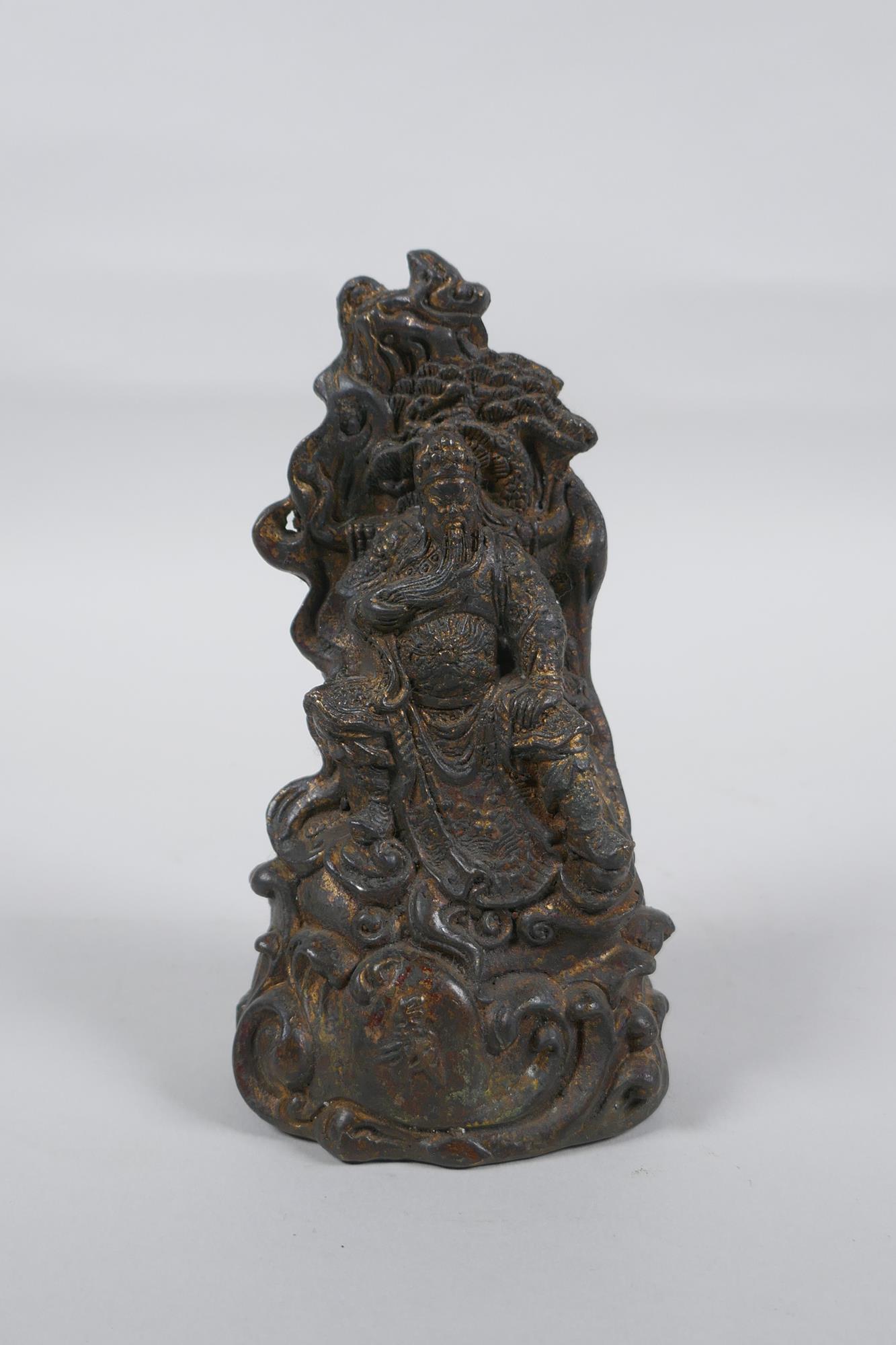 A Chinese gilt bronze figure of a warrior, 4 character mark to base, 15cm high