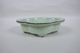 A Chinese celadon Ge ware planter of lobed form, 23 x 18cm, seal mark to base