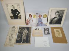 A collection of Dorothy Wilding items including photographs (some signed), an International News