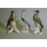 A Karl Ens porcelain figure of a woodpecker, marked 7527, 25cm high, a hawk 7514 and a stork 7800