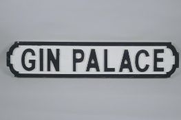 A painted wood 'Gin Palace' road sign, 14 x 65cm long