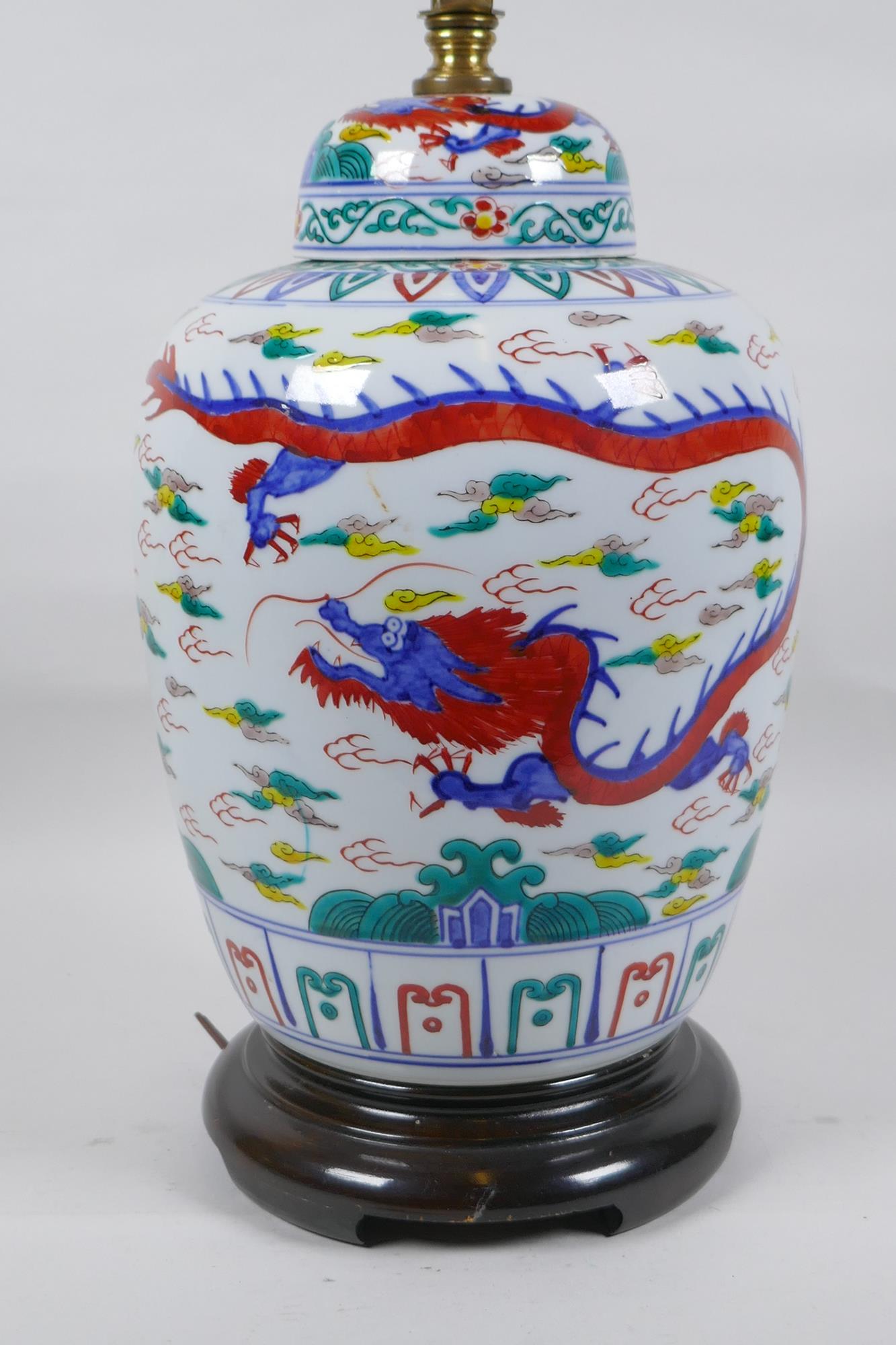 A Chinese Wucai porcelain jar and cover with dragon decoration, converted to a lamp, 41cm high - Image 2 of 5