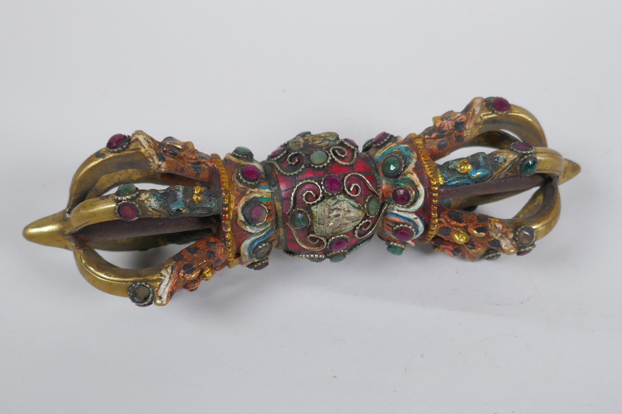 A Tibetan ceremonial bronze vajra with painted details and stone settings, 23cm long - Image 3 of 3