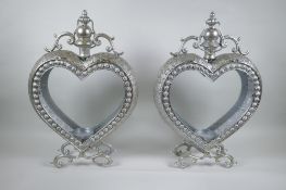 A pair of silvered metal heart shaped lanterns, 52cm high