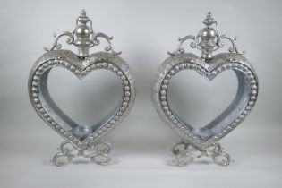 A pair of silvered metal heart shaped lanterns, 52cm high