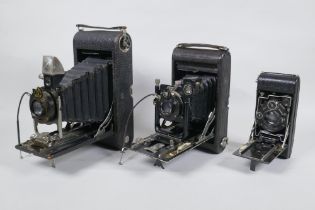 Three early C20th medium and large format cameras including a Kodak No.3A Autographic, a Houghton