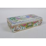 A C19th Chinese Cantonese enamelled porcelain scribes box and cover, the cover decorated with