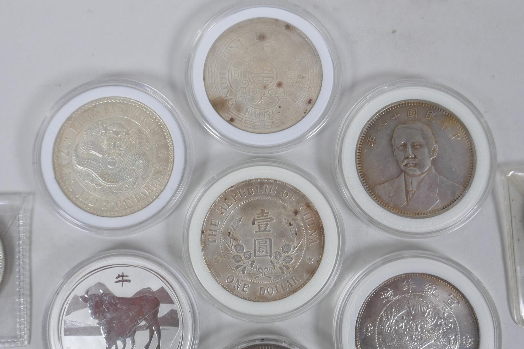 A quantity of Chinese facsimile (replica) white metal coinage, many coins in collector's cases - Image 2 of 5