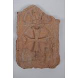 An antique terracotta panel with raised decoration of a coptic cross and figure, 10 x 16cm