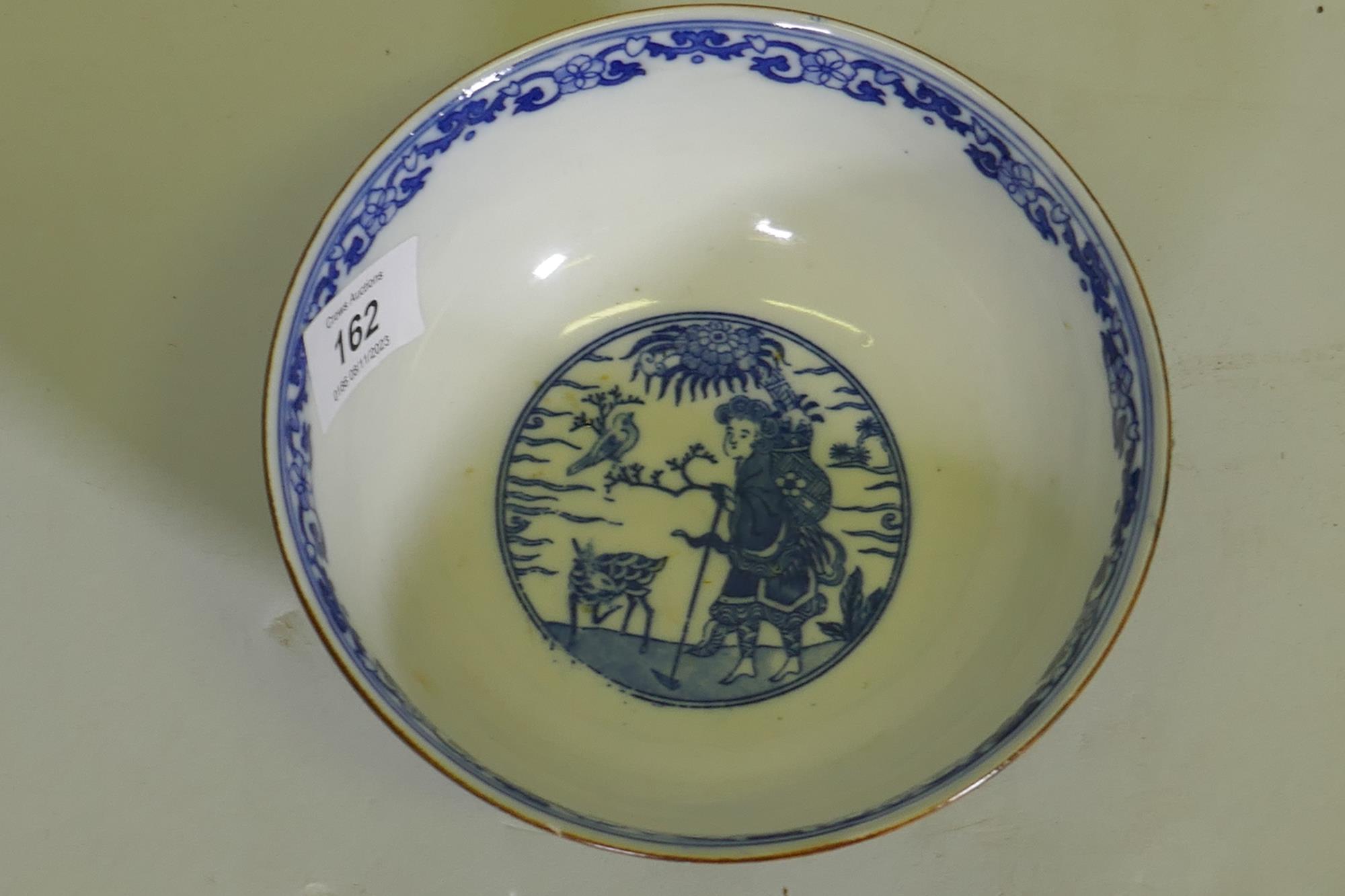 An oriental bowl with blue and white transfer decoration, 15cm diameter - Image 2 of 3