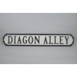 A painted wood Harry Potter 'Diagon Alley' road sign, 14 x 78cm long