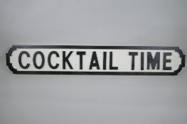 A painted wood 'Cocktail Time' road sign, 14 x 65cm long