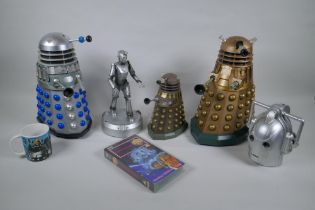 A quantity of Dr Who collectors' items, to include toy Daleks and Cybermen, moneybox, Earthshock VHS