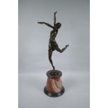 After Bruno Zack, bronze figure of a female dancer, raised on a marble socle, 63cm high