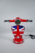 A painted metal table lamp in the form of a Vespa's handlebars, 33cm high