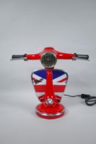 A painted metal table lamp in the form of a Vespa's handlebars, 33cm high