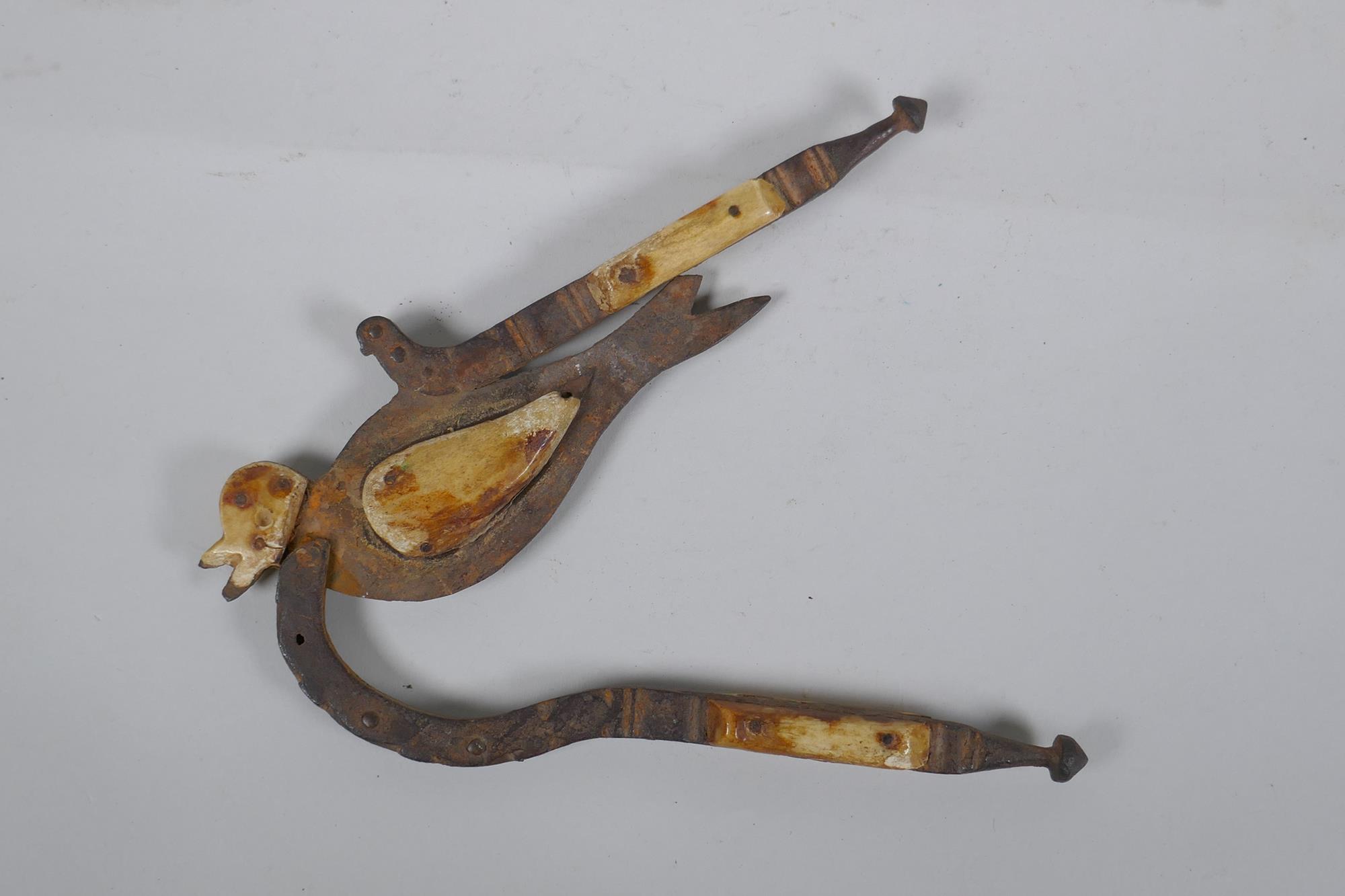 An antique Indian Betel nut cutter in the form of a bird, with bone mounts, 24cm long - Image 2 of 3