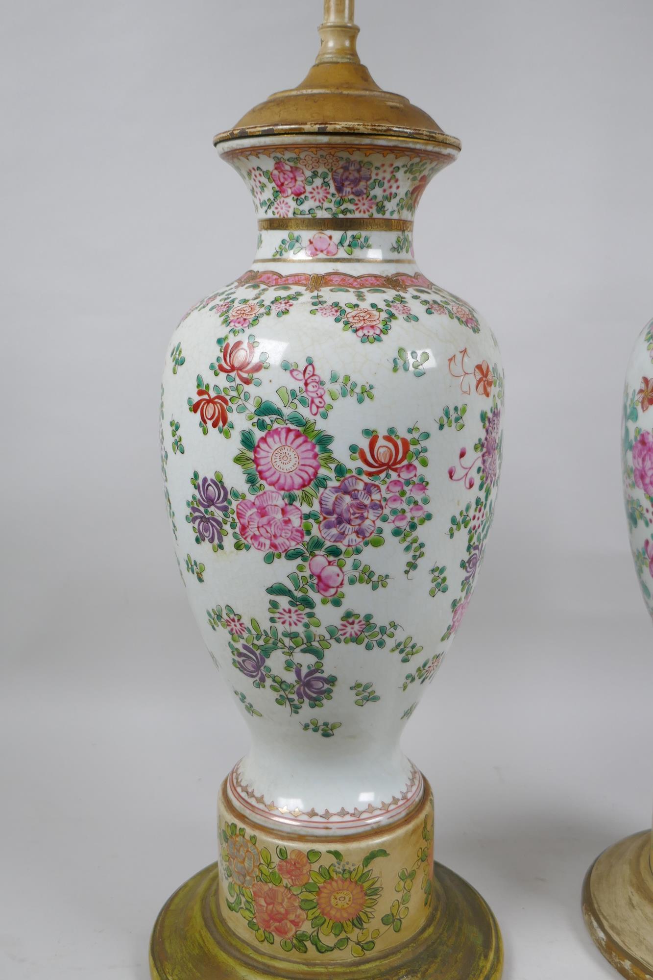 A pair of famille rose porcelain vases converted to lamps, with matching painted bases, 67cm highest - Image 2 of 5