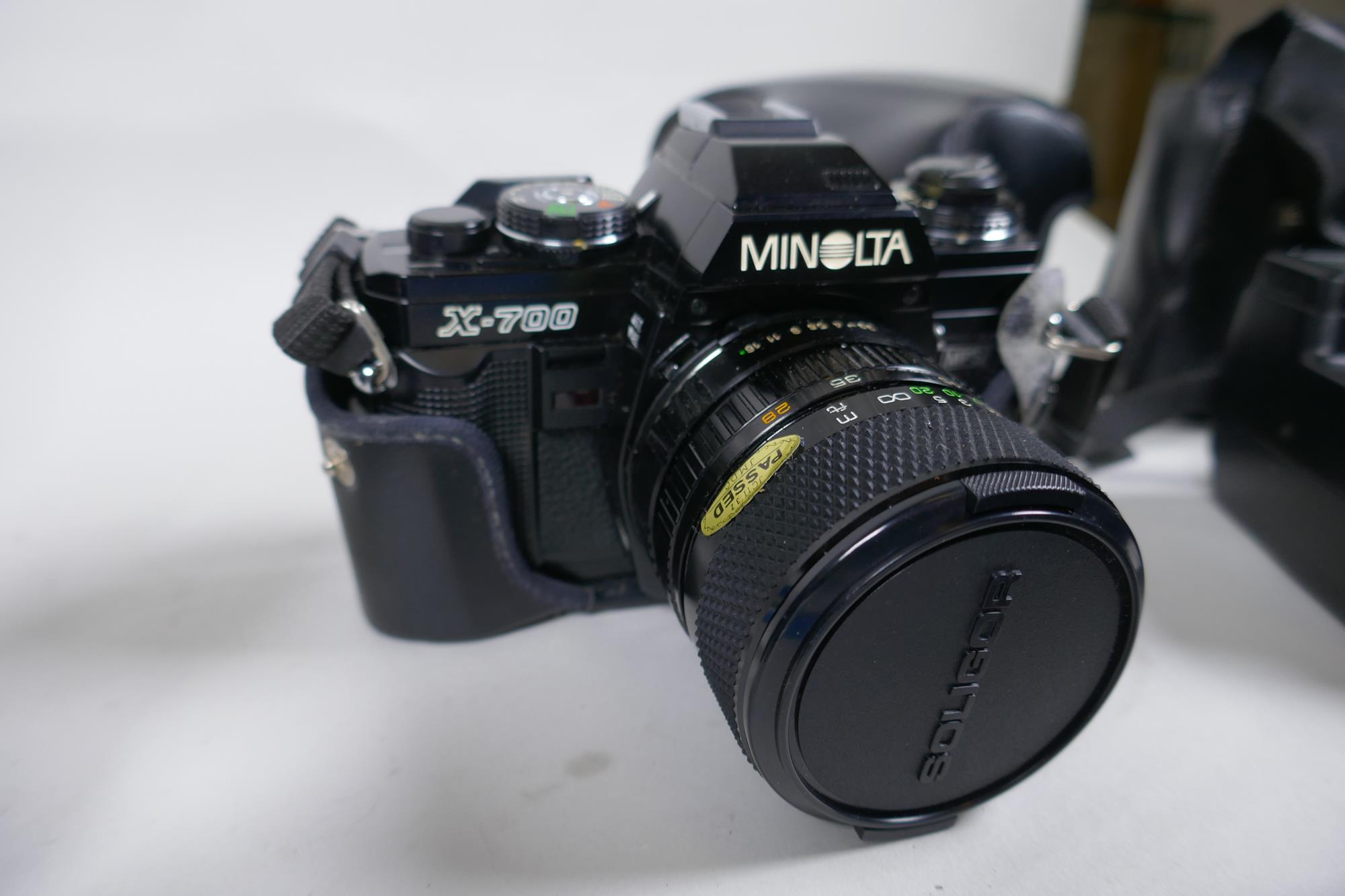 A Minolta X-700 SLR camera fitted with a Soligor zoom and macro 28-55mm lens, and a collection of - Image 2 of 9