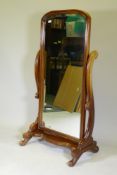 A Victorian style mahogany cheval mirror, with bevelled glass, 153cm high, 78cm wide