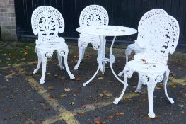 A painted aluminium Coalbrookdale style garden table and four chairs