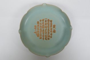 A Chinese Ru ware style porcelain dish with lobed rim and chased character inscription, 2
