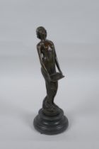 An Art Nouveau style bronze figure of a semi clad woman, 19cm high