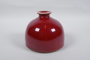 A Chinese flambe glazed porcelain water pot, 13cm diameter