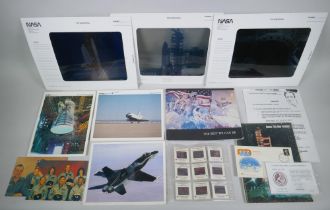 A quantity of NASA related collectables to include transparencies, informational cards, booklets,