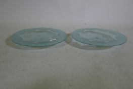 A pair of contemporary etched glass bowls