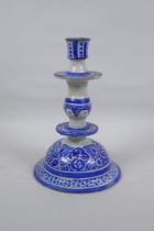 A blue and white tin glazed ceramic hookah base/candlestick, 25cm high