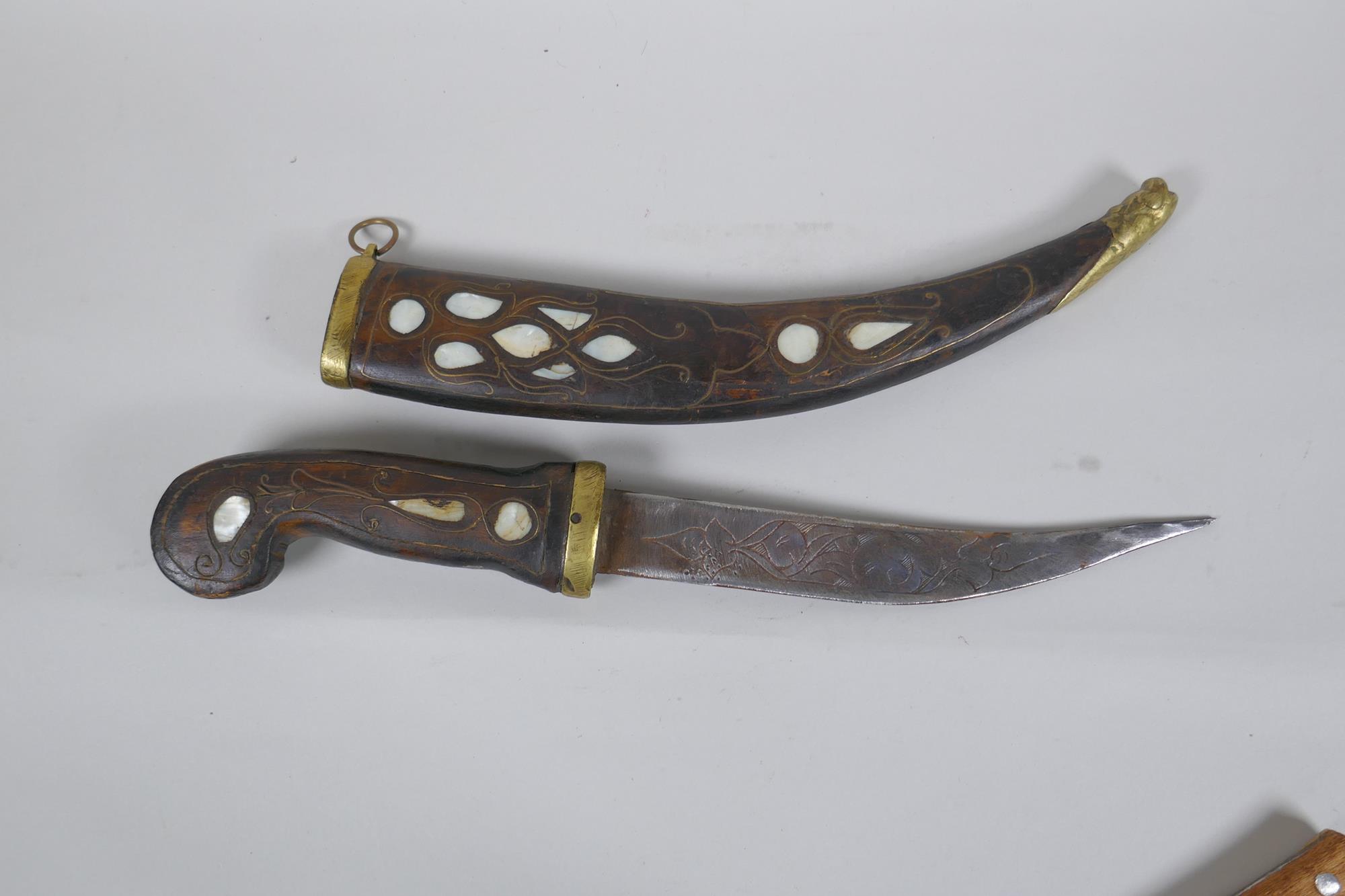 A Turkish dagger Jambiya, with mother of pearl inlaid wood handle and sheath, and brass mounts, - Image 3 of 5