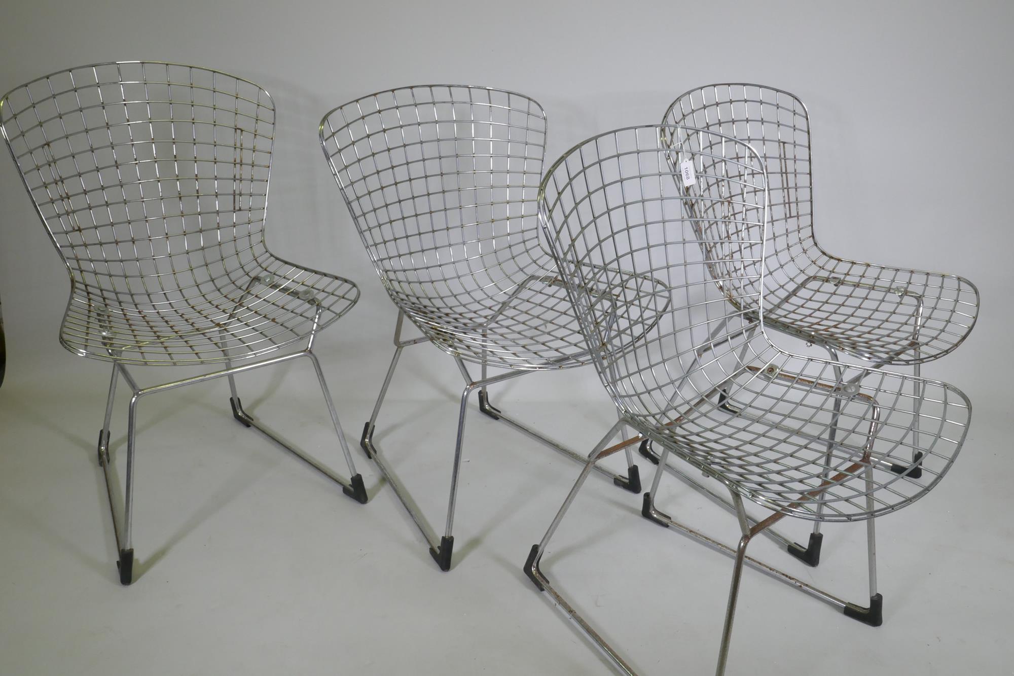 A set of four Harry Bertoia style wire dining chairs