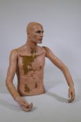 A Danish Hindsgaul fibreglass shop mannequin, male torso, 77cm high