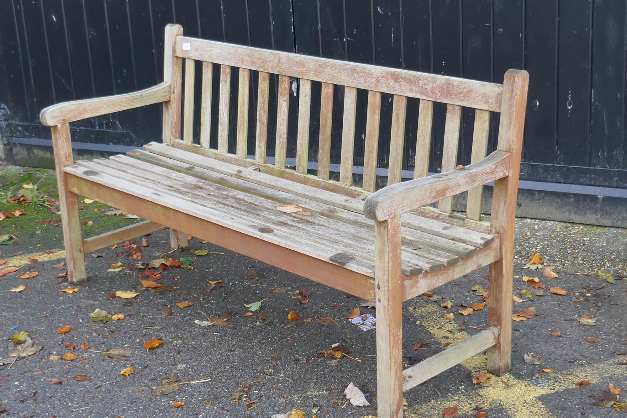 A teak garden bench, 153cm wide - Image 2 of 2