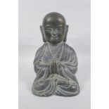 A Sino Tibetan bronze figure of Buddha, 28cm high