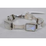 A white metal bracelet, tests as silver, set with crystal gem stones, 17cm long