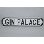 A painted wood 'Gin Palace' road sign, 14 x 65cm long