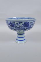 A Chinese blue and white porcelain stem bowl with dragon and lotus flower decoration, 12cm high x