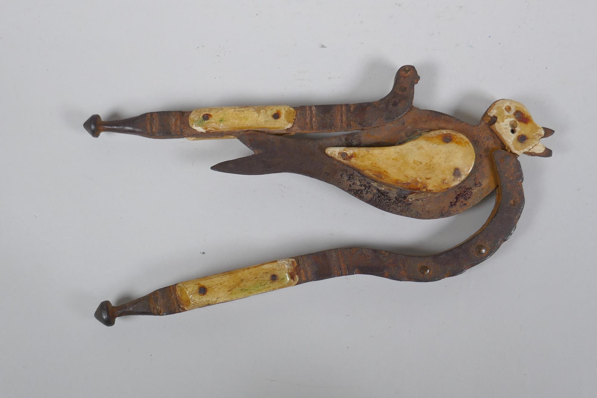 An antique Indian Betel nut cutter in the form of a bird, with bone mounts, 24cm long - Image 3 of 3