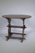 A C19th French oak trestle table, 66 x 90cm, 72cm high