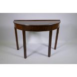 A C19th mahogany demi lune side table, raised on square supports, 103 x 46 x 72cm